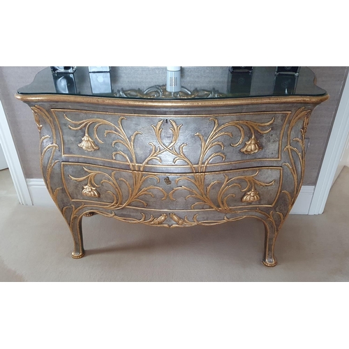 220 - Withdrawn. A Fabulous Serpentine Silver and Gilded Chest of Drawers with cabriole supports. 132 x 57... 