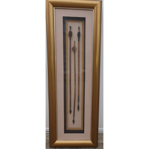 340 - A large African relief Picture of Zulu Spears. 47 x 136 cms approx.