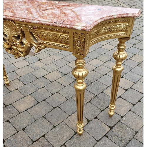 356 - A lovely Timber Gilt Console Table with a rouge marble top.128 x 40 x H 78 cms approx.