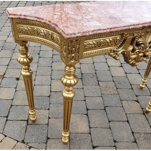 356 - A lovely Timber Gilt Console Table with a rouge marble top.128 x 40 x H 78 cms approx.