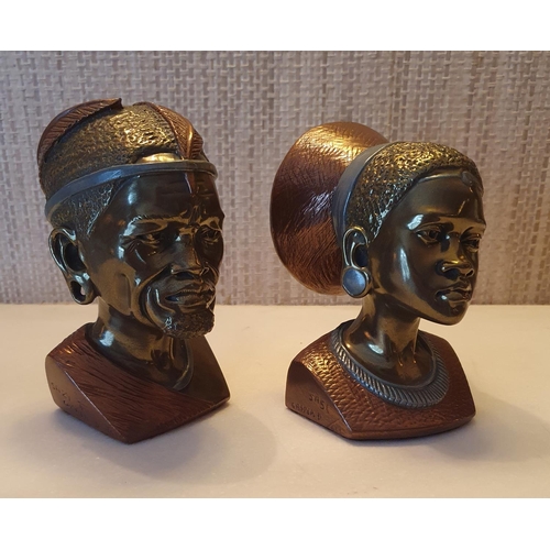 90 - A pair of Bronze and Copper African Heads. Stamped Casper (Casper Darare).