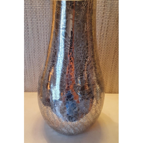 93 - A tall Glass Vase with shatter effect. 36cms high.