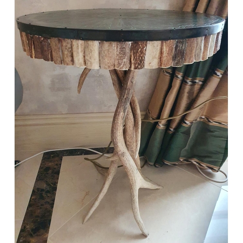 201 - Withdrawn. A lovely pair of antler Side Tables with metal top 68 cm x 50 cm in diameter.