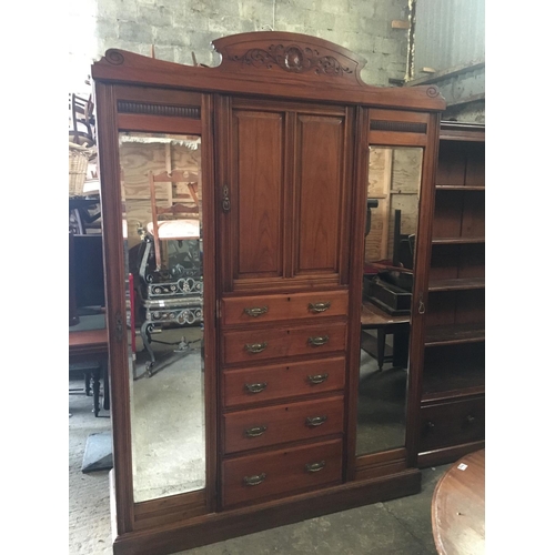 701 - A really good 19th Century Mahogany Wardrobe with a bank of drawers and two doors flanked by two mir... 