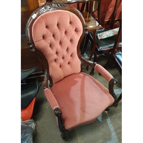 711 - A Victorian Mahogany Show Frame Armchair.