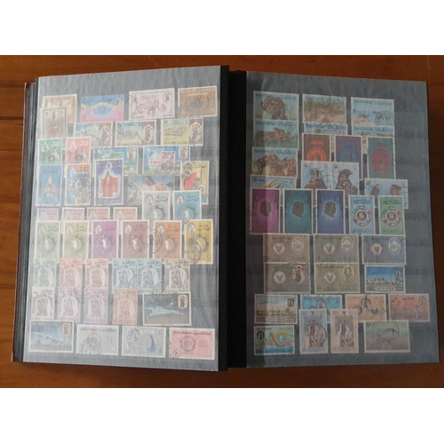 485 - Stamps: A large Abu Dhabi to Jordan, Middle East collection in 60 page stockbook.