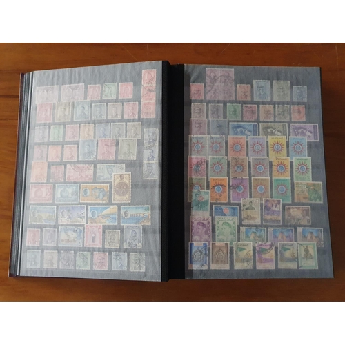 485 - Stamps: A large Abu Dhabi to Jordan, Middle East collection in 60 page stockbook.