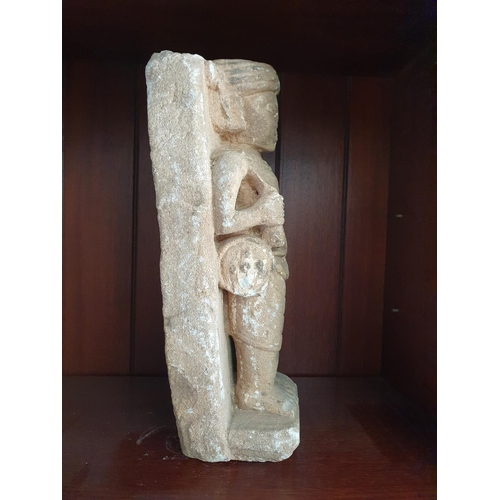 130 - A Stone Figure. 37 cms high approx.