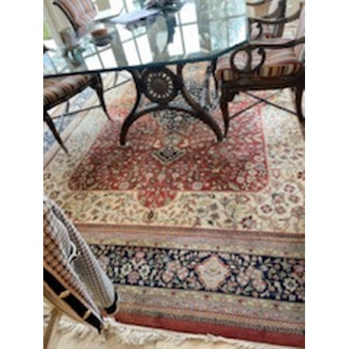 69 - A large Handwoven Kashan Carpet with cream ground multi borders and allover decoration. 380 x 264 cm... 