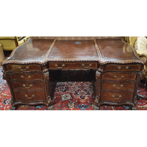 100 - A Fantastic Georgian Style Mahogany and veneered Partners Desk with carved canted corners and leathe... 