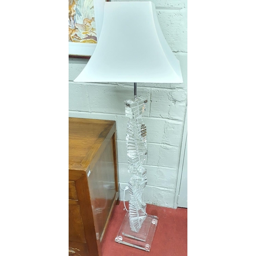 217 - A fantastic Crystal Standard Lamp with shaped outline.(slight damage to base) RRP €100.H 142 cms app... 