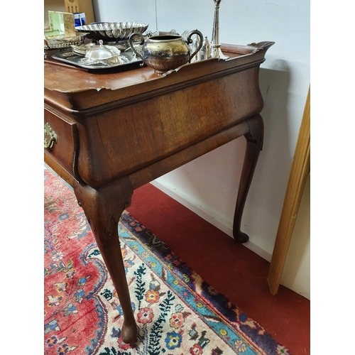 86 - Of Superb quality. A 19th Century Mahogany Silver table with a frieze drawer on cabriole legs with p... 