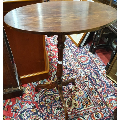 172 - An unusual 19th Century Pitch Pine stained oval Supper Table/Wine table on a simple pod. 55 x 37 x 7... 