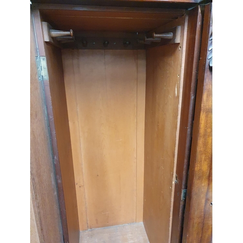 188 - A Victorian Mahogany three door Wardrobe with fitted centre. In need of some restoration. 185 x52.5 ... 