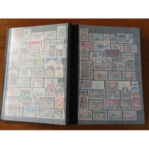 340 - Stamps: A large Ivory Coast to Portuguese colonies, Africa collection in 60 page stockbook.