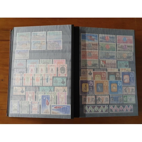 342 - Stamps: A large Abu Dhabi to Jordan, Middle East collection in 60 page stockbook.