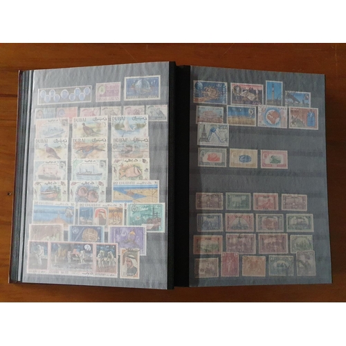 342 - Stamps: A large Abu Dhabi to Jordan, Middle East collection in 60 page stockbook.