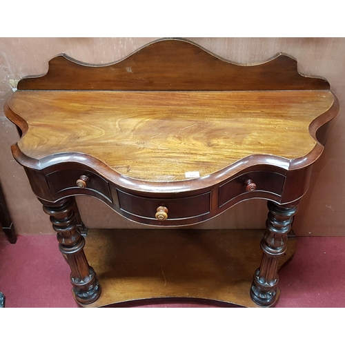 283 - A really good 19th Century serpentine fronted Side Table with a three drawer frieze with turned and ... 