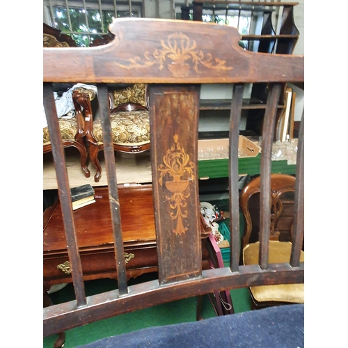 104 - An Edwardian Mahogany and Inlaid two seater Couch with slatted back on square tapered supports.