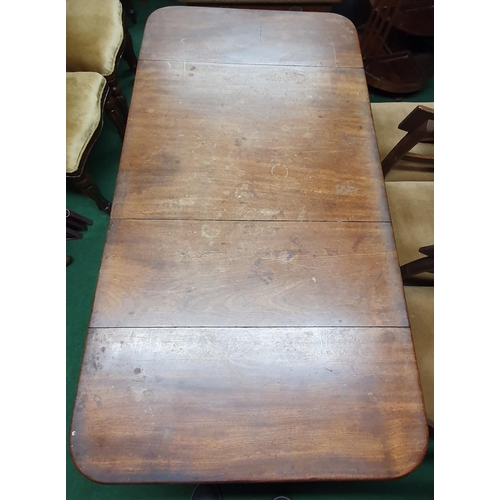 105 - A good Regency Mahogany Pembroke Table with barley twist supports and brass castors.