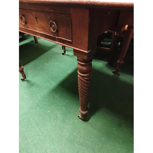 105 - A good Regency Mahogany Pembroke Table with barley twist supports and brass castors.