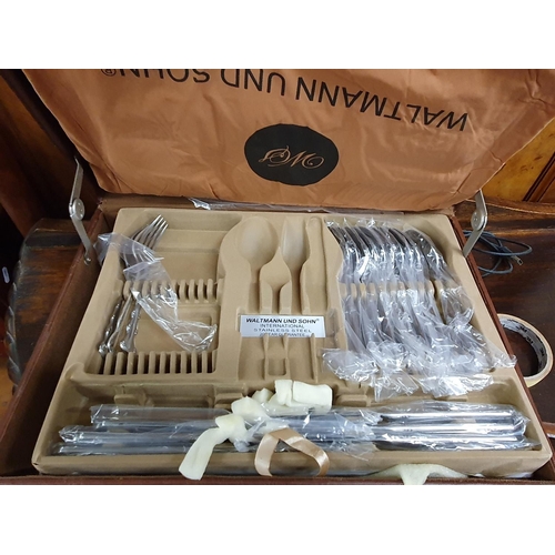 151 - A Waltmann and John kitchen Knife set along with a part cased set of Cutlery.