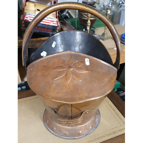 73 - A 19th Century Copper Coal Helmet.