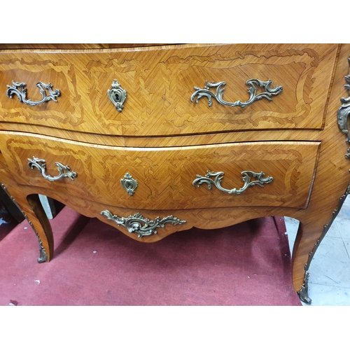 196 - A 19th Century Kingwood bombe shaped Continental Side Cabinet with rouge marble top and ormolu mount... 