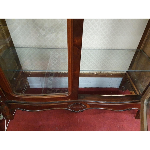 239 - A good 19th Armoire with highly carved and moulded front, bevelled edge glazed doors and glass shelv... 