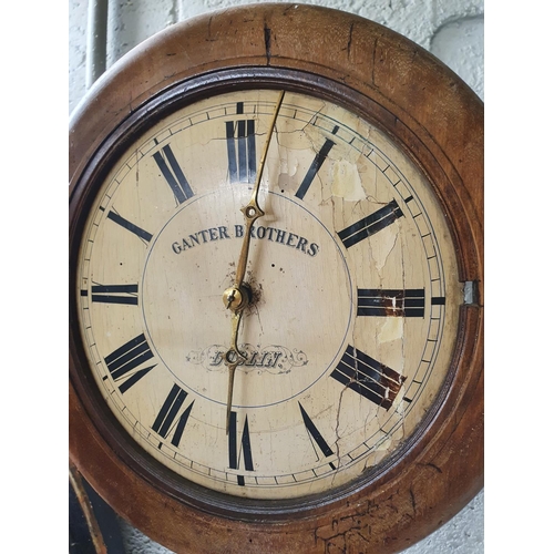 102 - A 19th Century Wall Clock by Ganter Brothers Dublin(with weights and pendulum). D 31 cms approx.