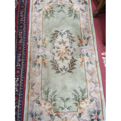 229 - Three Oriental Rugs. 62 x 130 cms and 154 x 78 cms approx (x2).