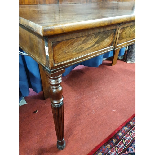 81 - A Victorian Mahogany Serving Table with turned supports, single frieze drawer and gallery back. W 17... 