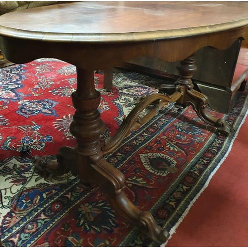 128 - A really good 19th Century oval Rosewood Library Table with stretcher base. 134 x 77 x H 74 cms appr... 