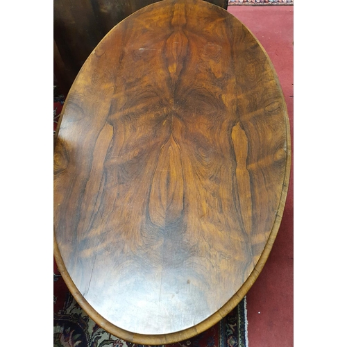 128 - A really good 19th Century oval Rosewood Library Table with stretcher base. 134 x 77 x H 74 cms appr... 