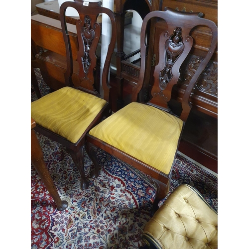 152 - A really good set of four 19th Century Mahogany Dining Chairs with carved backs.