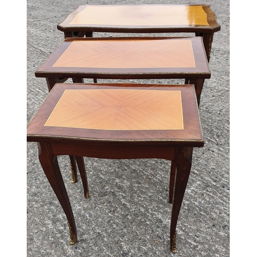 483 - A 20th Century Nest of three Tables.