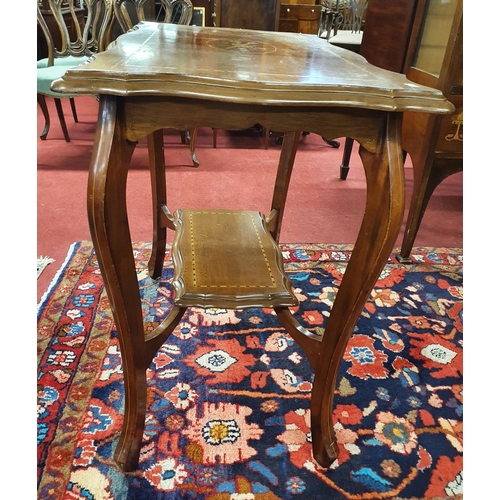 261 - An Edwardian Mahogany Centre Table with stretcher base. 78 x 48 cms approx.