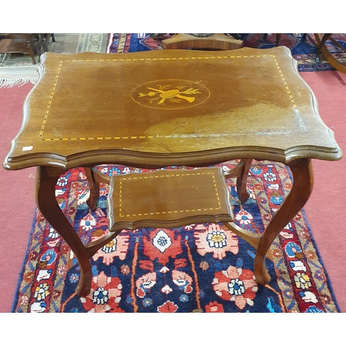 261 - An Edwardian Mahogany Centre Table with stretcher base. 78 x 48 cms approx.