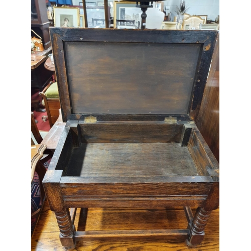 262 - An early 20th Century Piano Stool with upholstered top. 57 x 35 x H 42 cms approx.