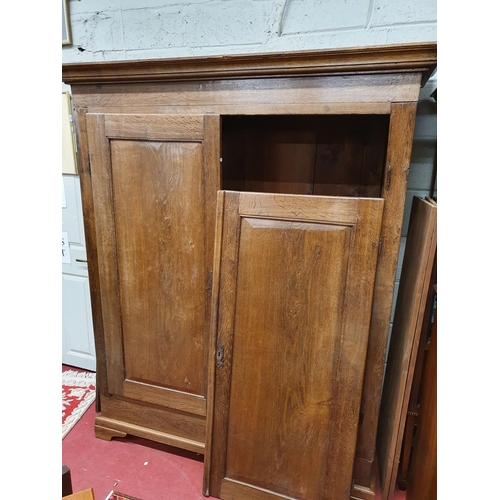 663 - A good 19th Century Oak Continental Armoire, ( door hinge broken). W 156 x D 57 x H 187 cms approx.