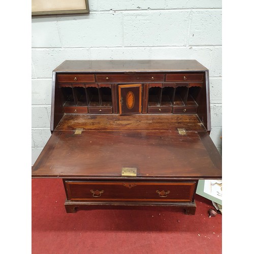 669 - A Period Sheraton Mahogany Bureau, crossbanded and inlaid with fitted interior. W 97.5 x D 52 x H 10... 