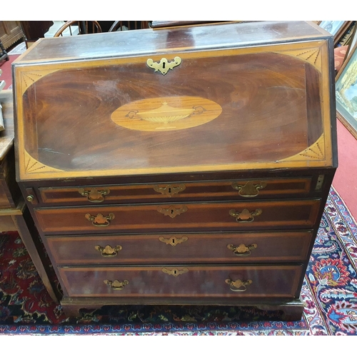 669 - A Period Sheraton Mahogany Bureau, crossbanded and inlaid with fitted interior. W 97.5 x D 52 x H 10... 