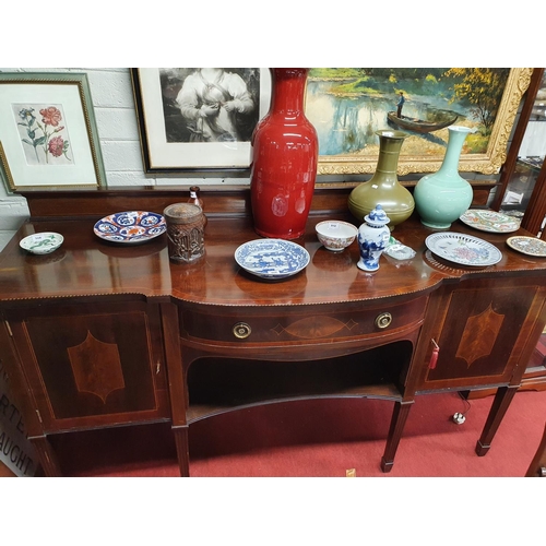 357 - A good late 19th Century Mahogany and Inlaid Sideboard with fluted tapered supports. c 1890-1900. 18... 