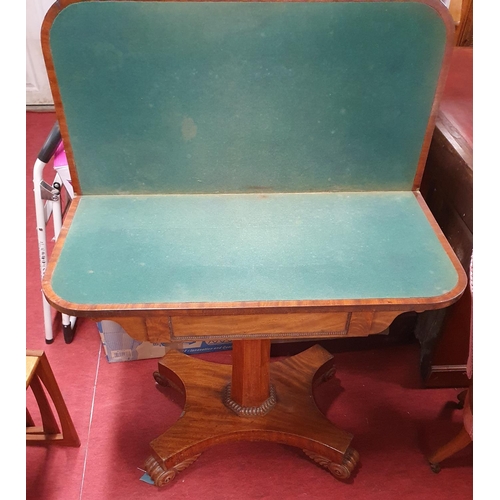 385 - Of superb quality; An Early 19th Century Mahogany fold over Card Table with platform base and molded... 