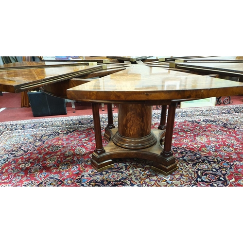 842 - A fantastic 20th Century Santos Rosewood crossbanded Mahogany Jupe Table with leaf holder with fully... 