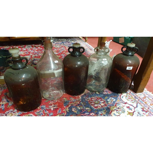 662 - A good quantity of Demijohns along with a quantity of Vintage Glass Bottles.