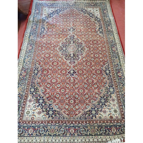 958 - A good Persian deep pile Carpet with Burgundy and Ivory ground multi borders and unique design (slig... 