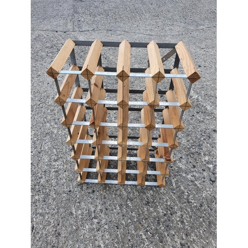 1042 - A timber and metal Wine Rack. 43 x 23  x 63 cms approx. (W x D x H).