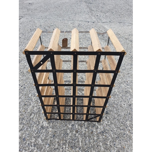 1042 - A timber and metal Wine Rack. 43 x 23  x 63 cms approx. (W x D x H).