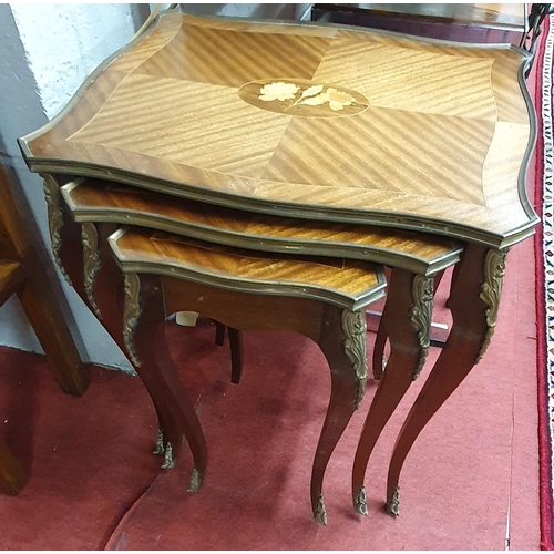 581 - A really good Nest of three early 20th Century Mahogany Tables with ormolu mounts. The largest 50 x ... 